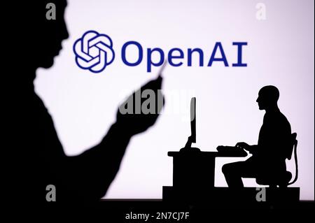 UK, LONDON. JANUARY 30, 2023: Open AI. The Intersection of Personal and Professional: Silhouette of Man and Web Developer Stock Photo