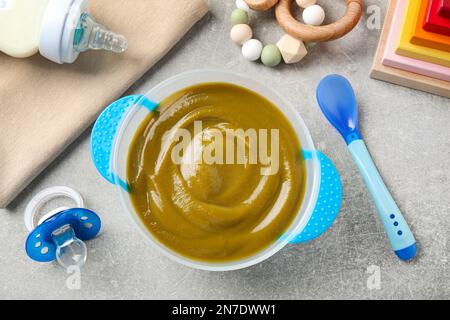 Flat lay composition with baby food and accessories on white background  Stock Photo - Alamy