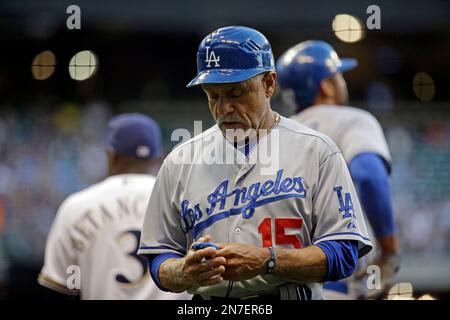 Los Angeles Dodgers first base coach Davey Lopes looks at a