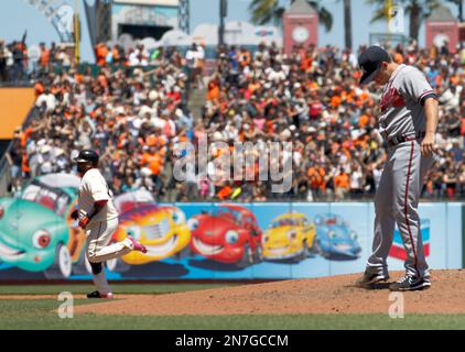 Former San Francisco Giants players Pablo Sandoval, left, and F.P.  Santangelo during a ceremony for longtime Giants clubhouse manager Mike  Murph Murphy being inducted into the team's Wall of Fame before a