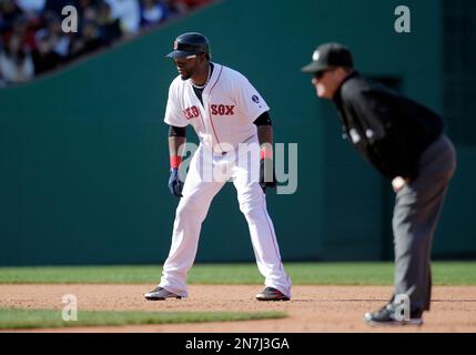 Boston Red Sox base runner Jacoby Ellsbury (46) beats the throw to Tampa  Bay Rays first basemen Carlos Pena (L) on a single to Tampa Bay Rays second  basemen Akinori Iwamura in