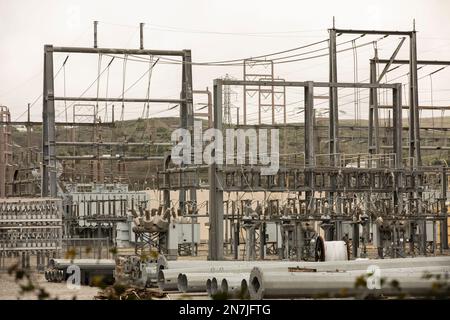 Daytime view of an electrical substation on a cloudy day. Stock Photo
