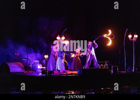 Original Signs, is a performance of dance, music and special effects created specifically for Venice Carnival 2023. Eight tableaux vivants performed by an international cast tell the story of human evolution: from the ancestral symbols of nature, to celestial symbols through an explosion of colour. The show about earth, water, air and fire runs until 21 February 2023 at the Venice Arsenal. Vibrant Pictures/Alamy Live News Stock Photo