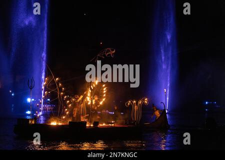 Original Signs, is a performance of dance, music and special effects created specifically for Venice Carnival 2023. Eight tableaux vivants performed by an international cast tell the story of human evolution: from the ancestral symbols of nature, to celestial symbols through an explosion of colour. The show about earth, water, air and fire runs until 21 February 2023 at the Venice Arsenal. Vibrant Pictures/Alamy Live News Stock Photo