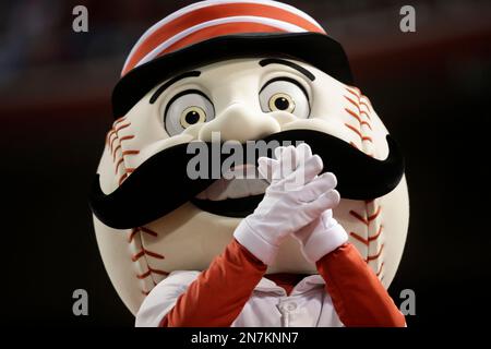 Cincinnati Reds' mascot Mr. Redlegs walks on the field prior to