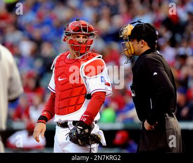 Texas Rangers catcher A.J. Pierzynski, right, talks with relief pitcher  Jason Frasor during a baseball game against the Seattle Mariners, Friday,  April 12, 2013, in Seattle. (AP Photo/Ted S. Warren Stock Photo 