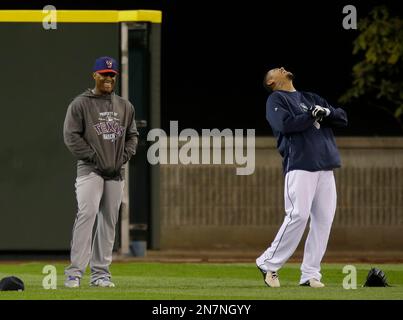 Former Seattle Mariners teammate Adrian Beltre, facing, hugs Félix