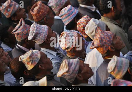 Nepalese Hindu Devotees Pull An Ancient Chariot Containing Depictions ...