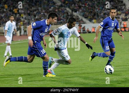 Saudi Arabia's Al Hilal soccer team players celebrate their trophy of the  AFC Champions League 2021 after the team beats South Korea's Pohang  Steelers 2-0 during their final soccermatch at the King