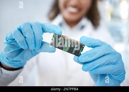 Microchip, tracker or motherboard in hands of engineer or electronics expert working on electric project. Technician, gloves and electrician with Stock Photo