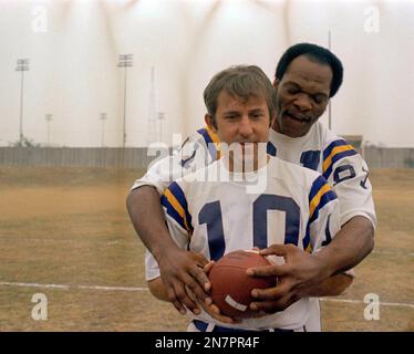 Fran Tarkenton, (10) Minnesota Vikings quarterback with teammate Carl Eller  (81), Jan. 7, 1974. Location unknown. (AP Photo/Ferd Kaufman Stock Photo -  Alamy