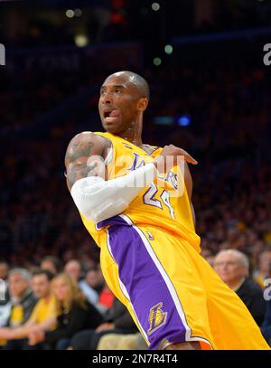 Kobe Bryant of the Los Angeles Lakers poses for a photo after winning