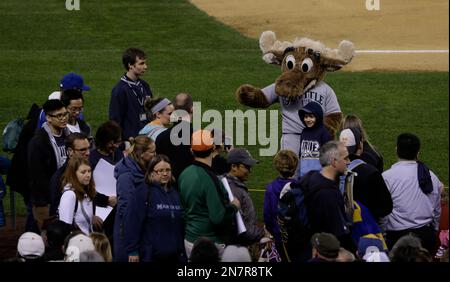 Moose, the Seattle Mariners' mascot, greets George The Moose Man King  outside Safeco Field prior to the Mariners' home opener MLB baseball game  against the Oakland Athletics, Friday, April 13, 2012, in