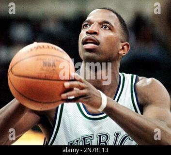 https://l450v.alamy.com/450v/2n7rt13/file-dallas-mavericks-forward-ac-green-shoots-a-free-throw-during-the-fourth-quarter-against-the-vancouver-grizzlies-in-dallas-in-this-file-photo-taken-march-13-1999-police-said-thursday-march-28-2013-three-nba-championship-rings-belonging-to-green-have-been-stolen-from-his-southern-california-home-ap-photobill-janscha-file-2n7rt13.jpg