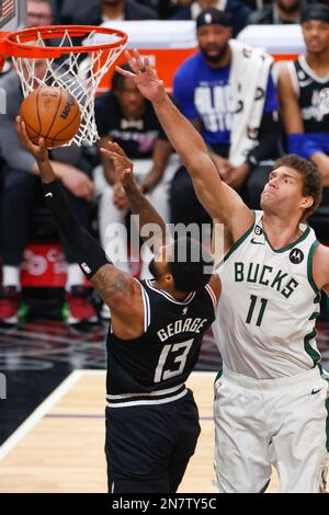 Los Angeles Clippers forward Paul Pierce (34) bends down to kiss the ...