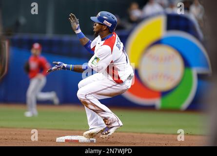 Dominican Republic's Jose Reyes, left, celebrates with teammate Nelson Cruz  their 9-0 victory over Panama at a World Baseball Classic game in San Juan,  Sunday, March 8, 2009. (AP Photo/Fernando Llano Stock