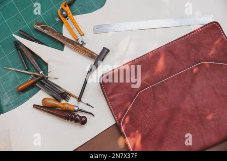 closeup hand tool for leather tailor maker. old handcraft master piece working equipments. Stock Photo