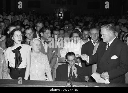 First baseman of the Philadelphia Phillies Eddie Waitkus and Carol Webel of  Albany leave the altar of St. Patrick's Church in Albany, N.Y., Nov. 17,  1951, after their wedding ceremony. (AP Photo