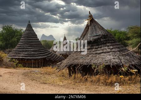 Traditionally built huts of the Laarim tribe, Boya hills, Eastern Equatoria, South Sudan Stock Photo