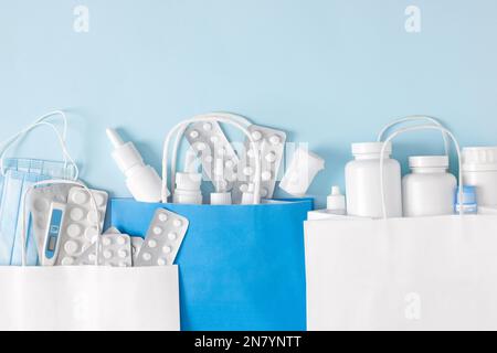 Various medicines, medical and pharmaceutical products in paper bags. Copy space Stock Photo