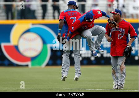 Dominican Republic's Jose Reyes, left, celebrates with teammate Nelson Cruz  their 9-0 victory over Panama at a World Baseball Classic game in San Juan,  Sunday, March 8, 2009. (AP Photo/Fernando Llano Stock