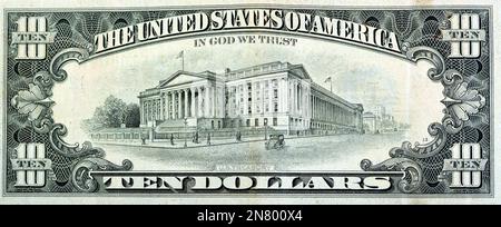 Large fragment of the reverse side of old 10 $ ten American dollars bill banknote series 1988 features  the U.S. Treasury Building, selective focus of Stock Photo