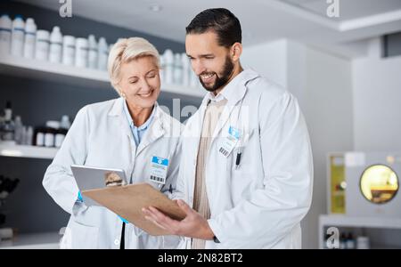 Science, research and team with clipboard and tablet in laboratory for analytics, medical report and checklist. Pharmacy, healthcare and scientists Stock Photo