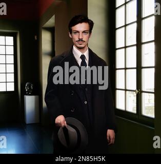 vintage portrait of a man with hat in his hand Stock Photo
