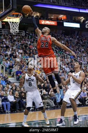 Utah Jazz's Enes Kanter (0) dunks the ball as Charlotte Bobcats ...