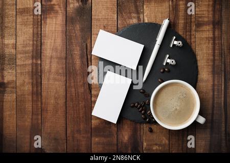Blank stationery set and coffee cup. Mockup for branding identity. Flat lay. Stock Photo
