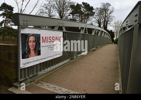 A missing person appeal poster for Nicola Bulley on a bridge crossing the River Wyre in St Michael's on Wyre, Lancashire, as police continue their search for Ms Bulley, 45, who was last seen on the morning of Friday January 27, when she was spotted walking her dog on a footpath by the river. Picture date: Saturday February 11, 2023. Stock Photo