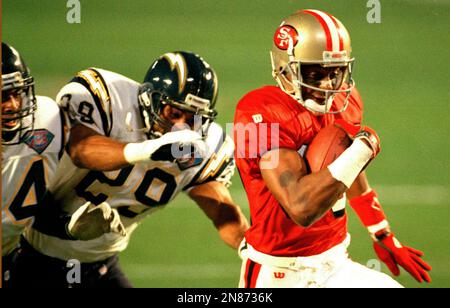 NFL FILE: Jerry Rice (80) and Steve Young (8) of the San Francisco 49ers  during Super Bowl XXIX at Joe Robbie Stadium in Miami, Florida. Young threw  a record 6 touchdowns and