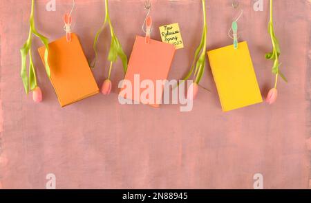 New book releases for spring flat lay with book, tulips and specs. Spring Book fair, inspiration,reading, education, literature concept, free co Stock Photo