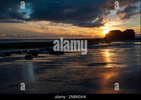 Sandy beach on sunset in Bundoran town, Ireland Stock Photo