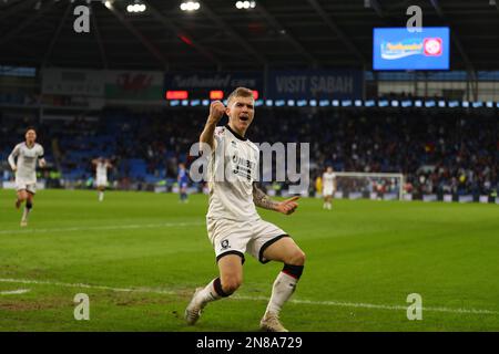 Cardiff, UK. 11th Feb, 2023. Riley McGree of Middlesbrough celebrates after he scores his teams 3rd goal. EFL Skybet championship match, Cardiff city v Middlesbrough at the Cardiff City Stadium in Cardiff, Wales on Saturday 11th February 2023. this image may only be used for Editorial purposes. Editorial use only, pic by Andrew Orchard/Andrew Orchard sports photography/Alamy Live news Credit: Andrew Orchard sports photography/Alamy Live News Stock Photo