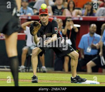 Mark Grace of the Chicago Cubs in the dugout before a 1999 Major League  Baseball season game against the Los Angeles Dodgers in Los Angeles,  California. (Larry Goren/Four Seam Images via AP