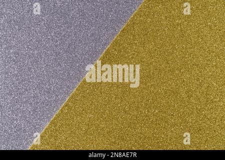 Background of shiny gray and golden paper in bright colors, geometric pattern. Minimal concept. Stock Photo