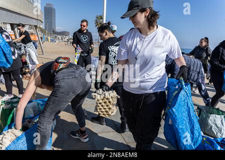 Barcelona, Spain. 11th Feb, 2023. A group of volunteers separates all the waste they have collected to recycle it. The Clean Beach Initiative is an organization established in 2018 to protect the environment by cleaning beaches and preventing ocean pollution. (Photo by Axel Miranda/SOPA Images/Sipa USA) Credit: Sipa USA/Alamy Live News Stock Photo