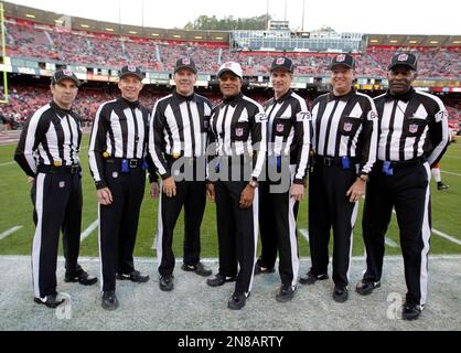 Officials pose for a picture before the NFC Championship NFL football ...