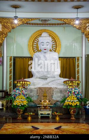 the white Buddha at the Wat Thang Sai the Town of Ban Krut in the Province of Prachuap Khiri Khan in Thailand,  Thailand, Ban Krut, December, 2022 Stock Photo