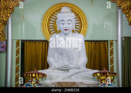 the white Buddha at the Wat Thang Sai the Town of Ban Krut in the Province of Prachuap Khiri Khan in Thailand,  Thailand, Ban Krut, December, 2022 Stock Photo