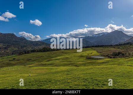 Panoramic view of the valley with the snow-capped Madonie peaks in the background, Sicily Stock Photo