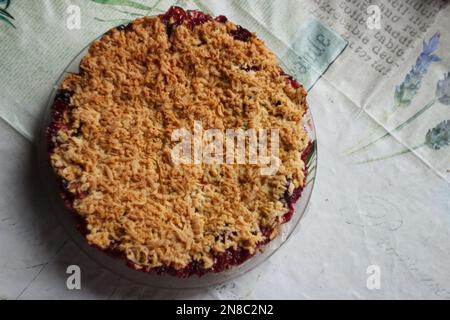 Plum pie on the plate Stock Photo
