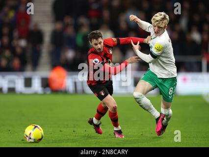 Bournemouth's Adam Smith collides with Newcastle United's Anthony Gordon during the Premier League match at the Vitality Stadium, Bournemouth. Picture date: Saturday February 11, 2023. Stock Photo