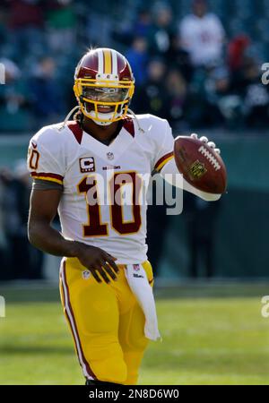 Washington Redskins quarterback Robert Griffin III (10) warms up