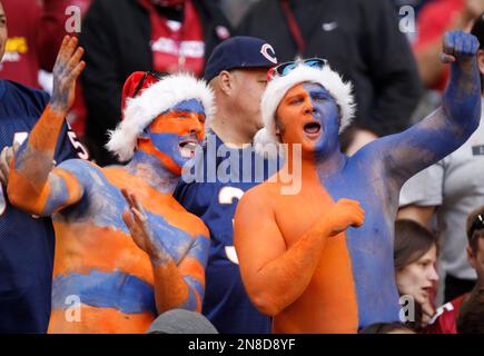 Chicago Bears fans cheer on their team during the second half of an NFL  football game against t …