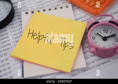 The Helpful Tips text on a paper Stock Photo