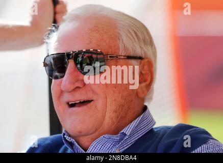 Former Miami Dolphins head coach Don Shula celebrates with teammates of the  1972 Miami Dolphins perfect season team as they were honored during  halftime of the Miami Dolphins Buffalo Bills game at