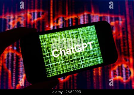 Digital composite of Microsoft ChatGPT OpenAI chatbot logo on phone screen Stock Photo