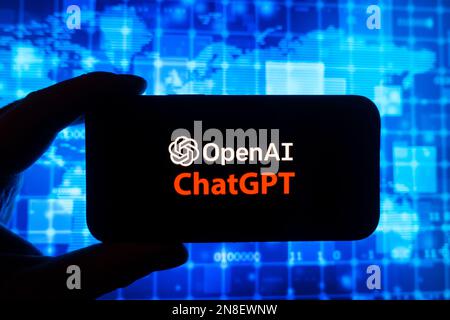 Digital composite of Microsoft ChatGPT OpenAI chatbot logo on phone screen Stock Photo
